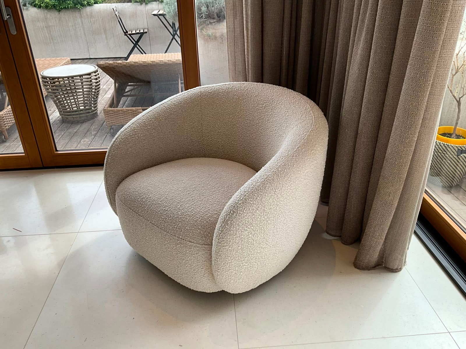 Pair of Eichholtz Brice Swivel Armchairs in Cream Bouclé