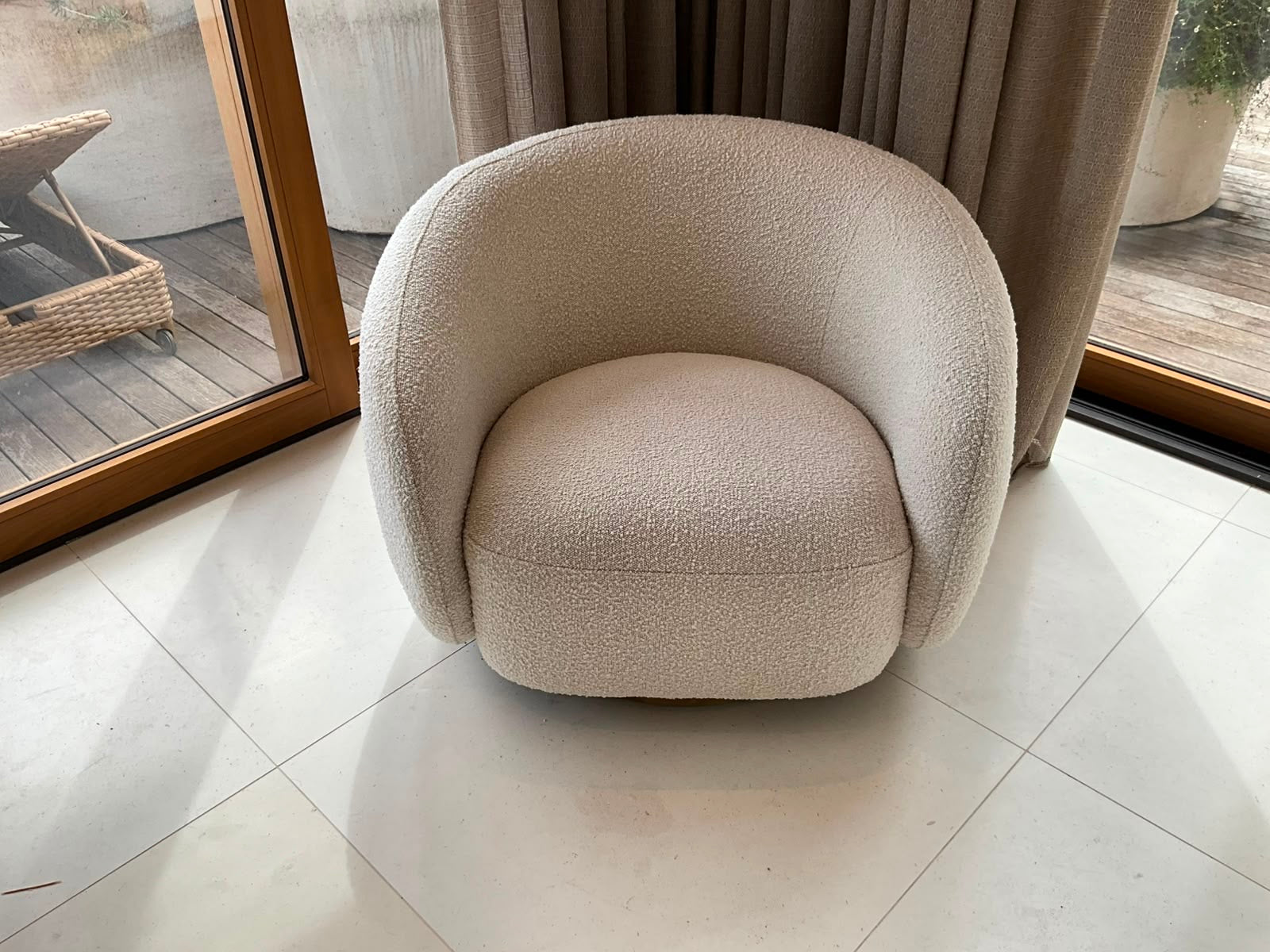 Pair of Eichholtz Brice Swivel Armchairs in Cream Bouclé