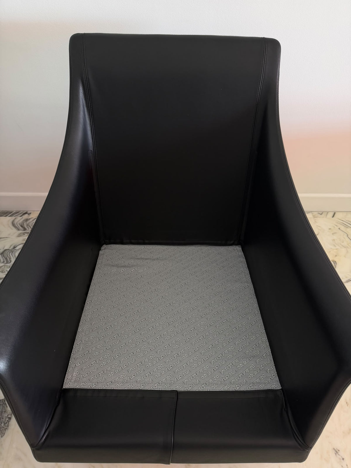 Pair of Flexform Boss Black Leather Swivel Armchairs