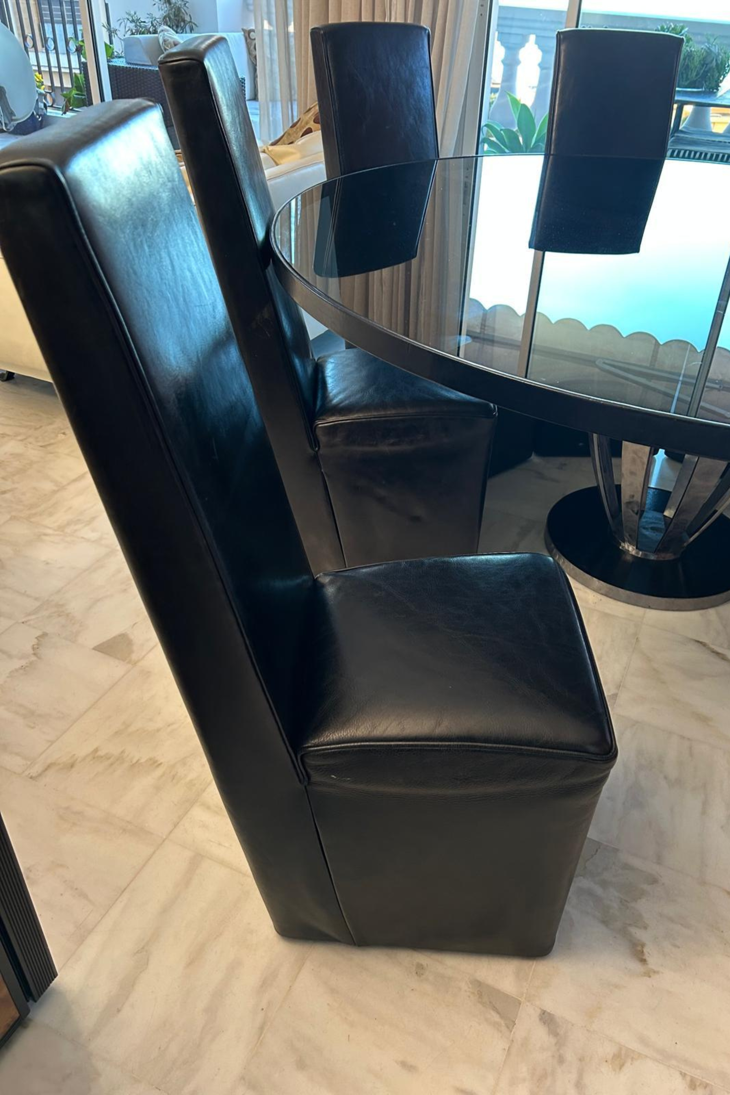 Baxter Round Dining Table with 8 Leather Dining Chairs