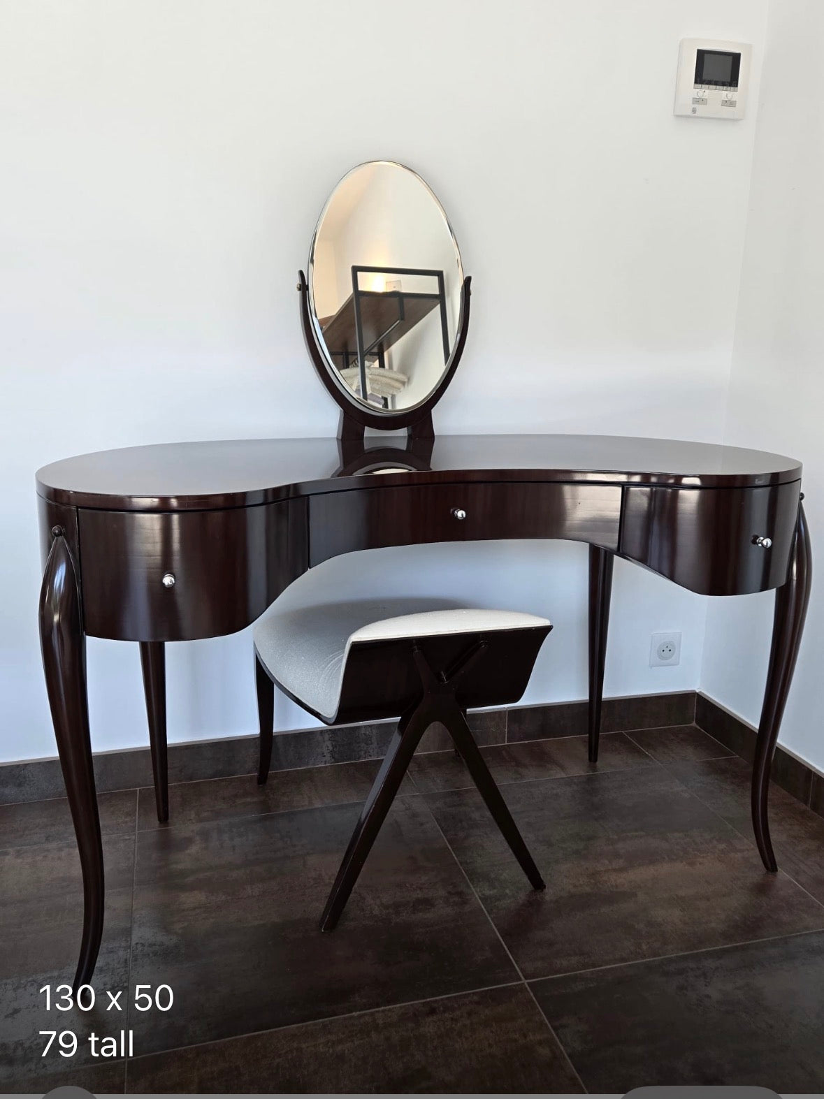 Marina Fogg Allegra dressing table with mirror and stool, featuring a sculptural curved design and sleek, modern finish.
