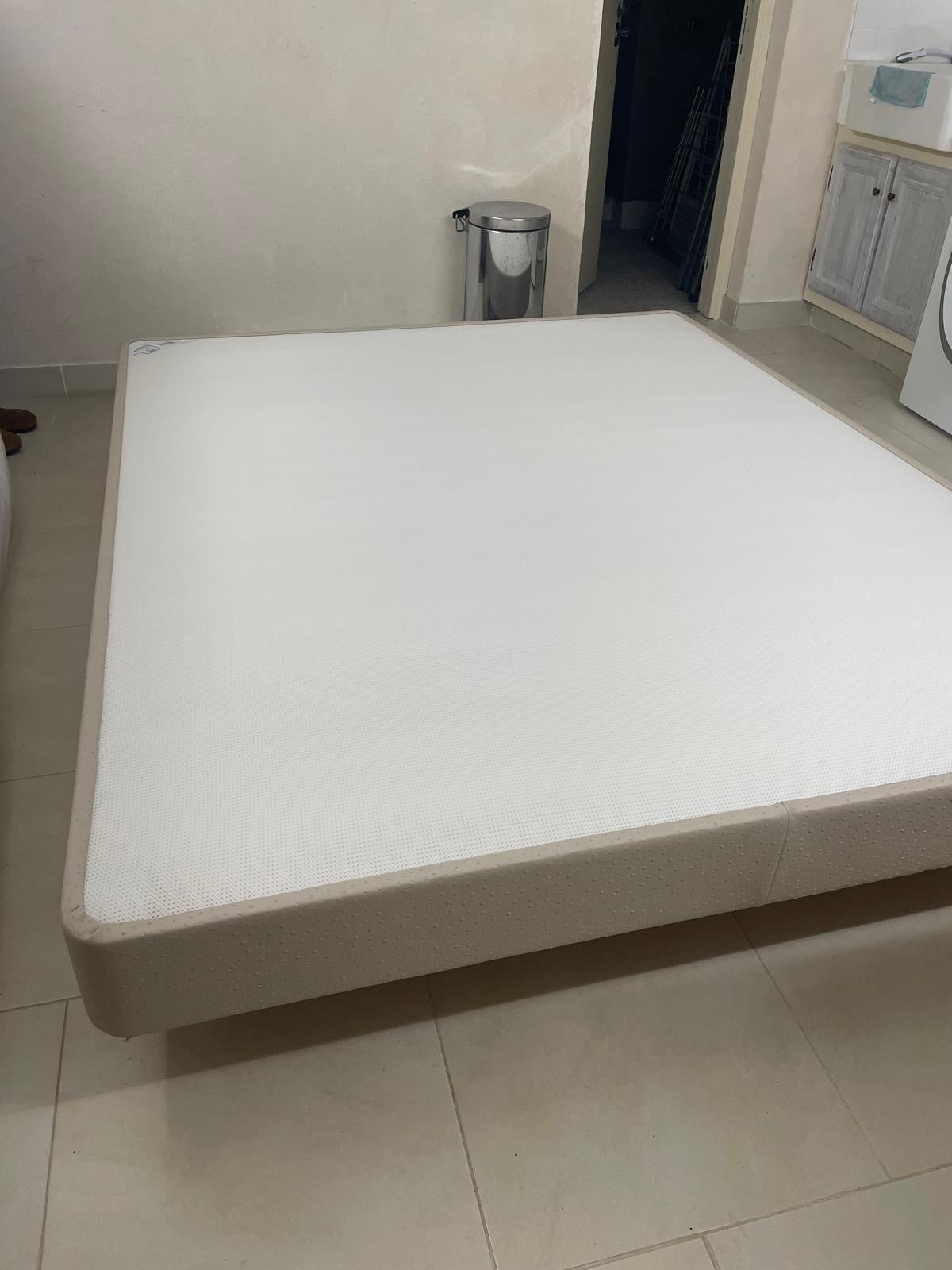 Double bed with mattress from Reserve by Meublesmonaco.com, featuring a modern wooden frame and plush bedding.