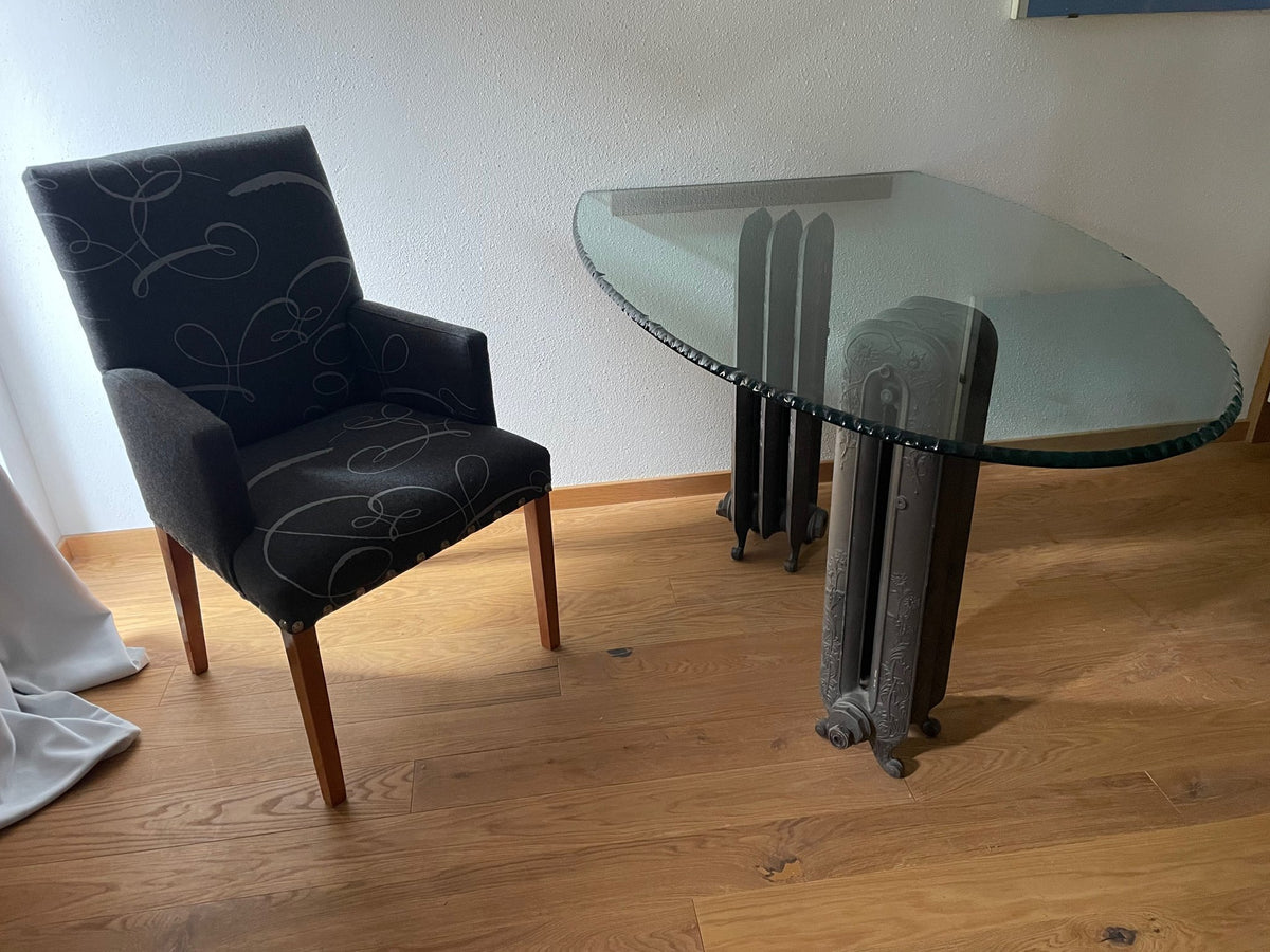 Ghyslaine de Freijo bespoke glass desk on two Art Nouveau cast-iron radiator bases, three-quarter view
