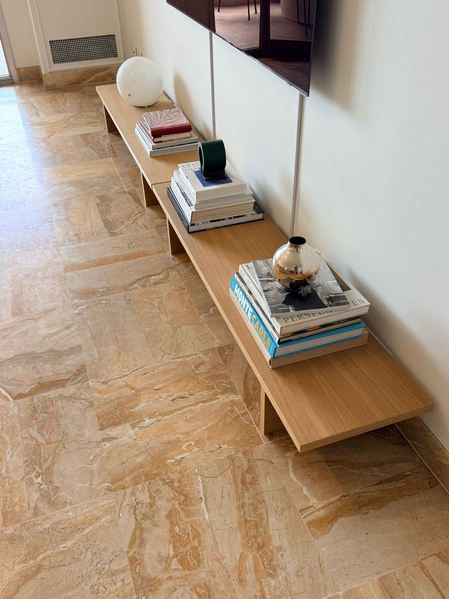 Set of two Ferm Living oak console tables or benches with sleek, minimalist design by Charlotte Isackson, showcasing smooth wood finish.