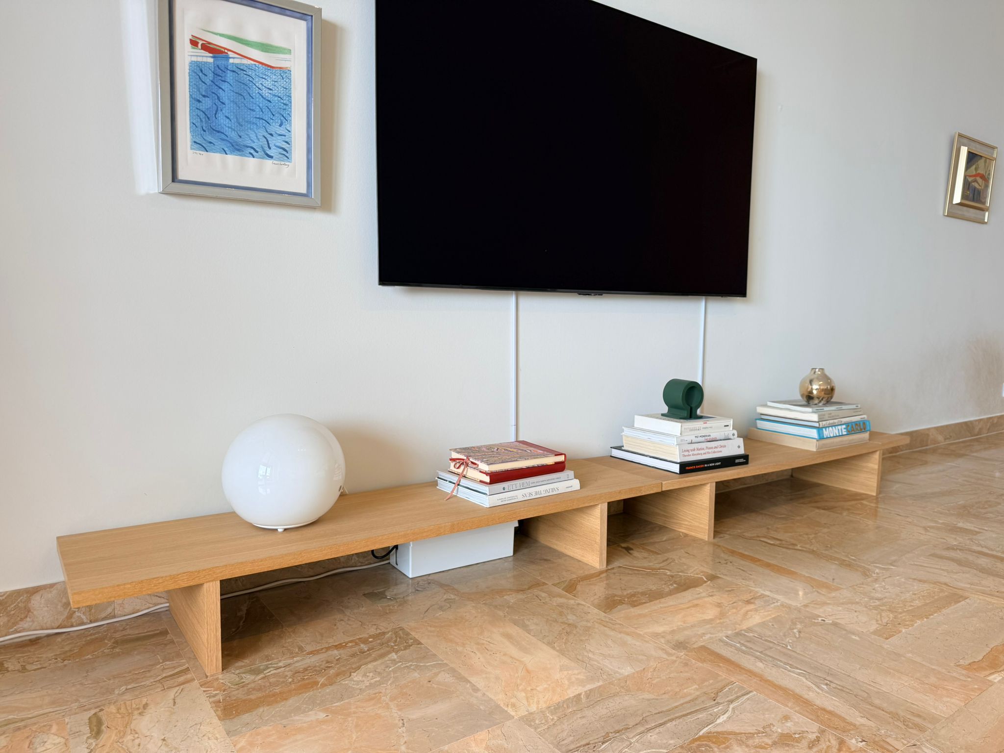 Set of two Ferm Living oak console tables by Charlotte Isackson with sleek, minimalist design and natural wood finish.