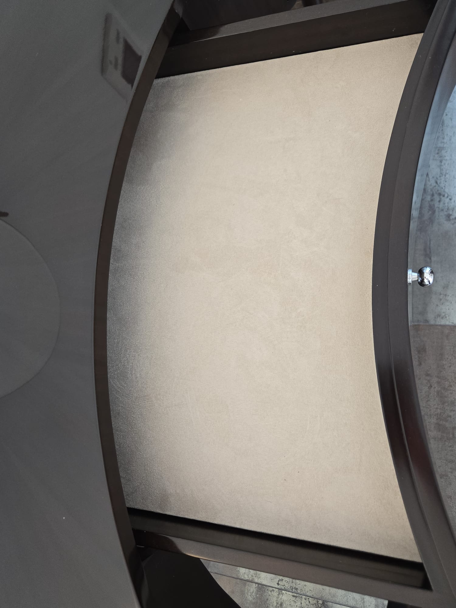 Marina Fogg Allegra dressing table with mirror and stool featuring a sculptural curved design in modern bedroom decor.