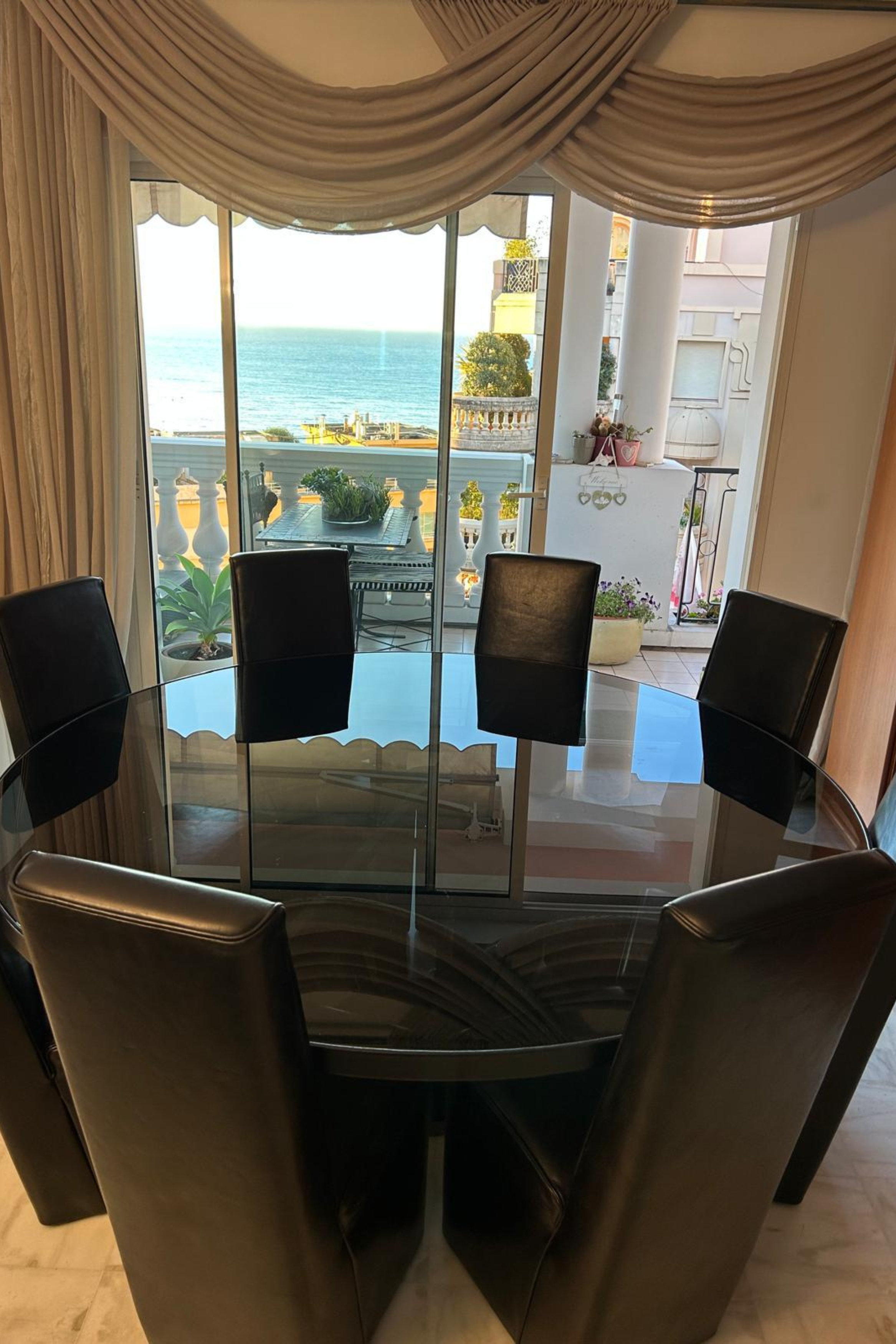 Baxter Round Dining Table with 8 Leather Dining Chairs