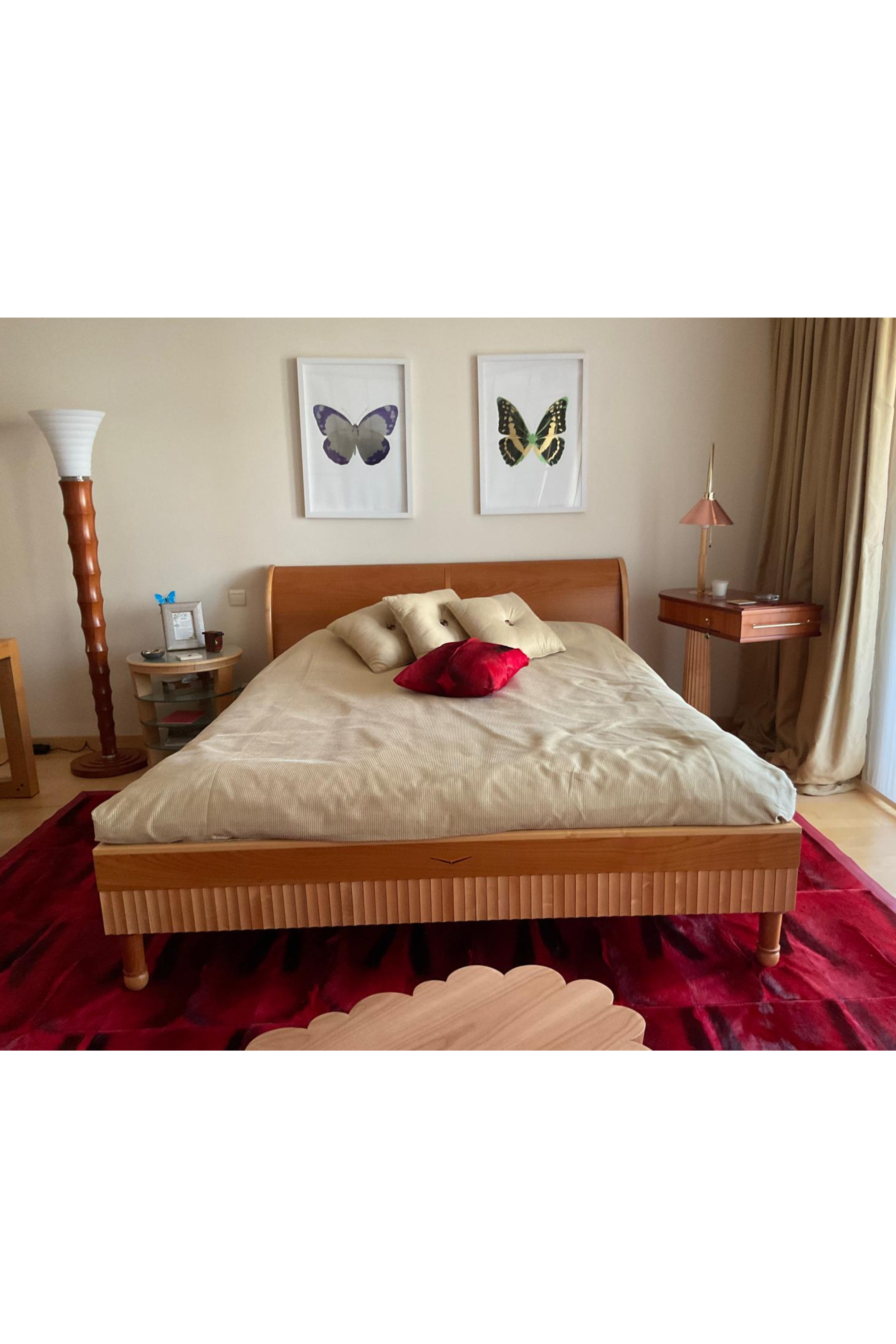 Wooden ASSARAF Monika maple and cherry bed with built-in storage, in excellent condition, measuring 235x185cm.