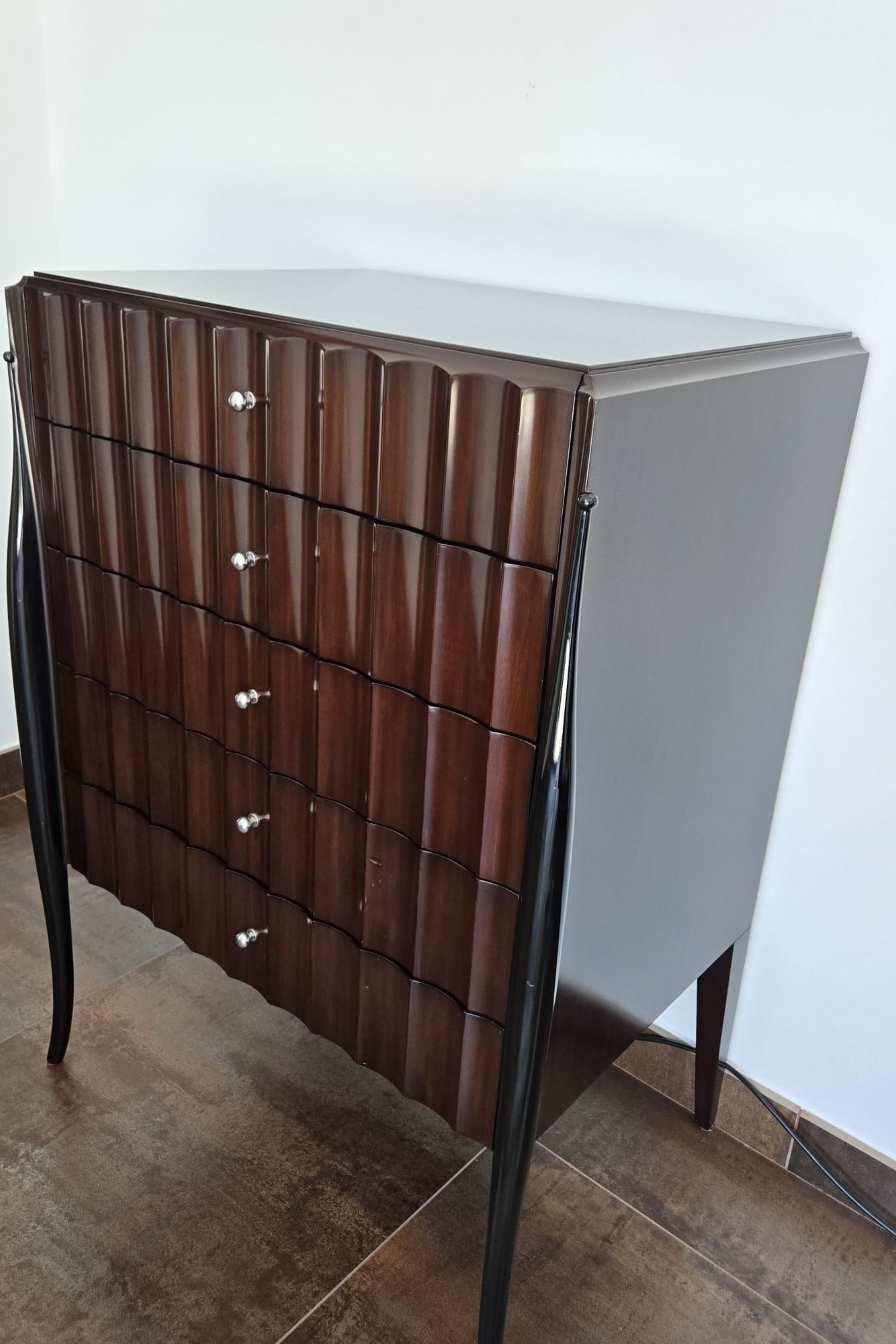 Marina Fogg Allegra sculptural chest of drawers with curved wood front and statement design, modern storage solution.