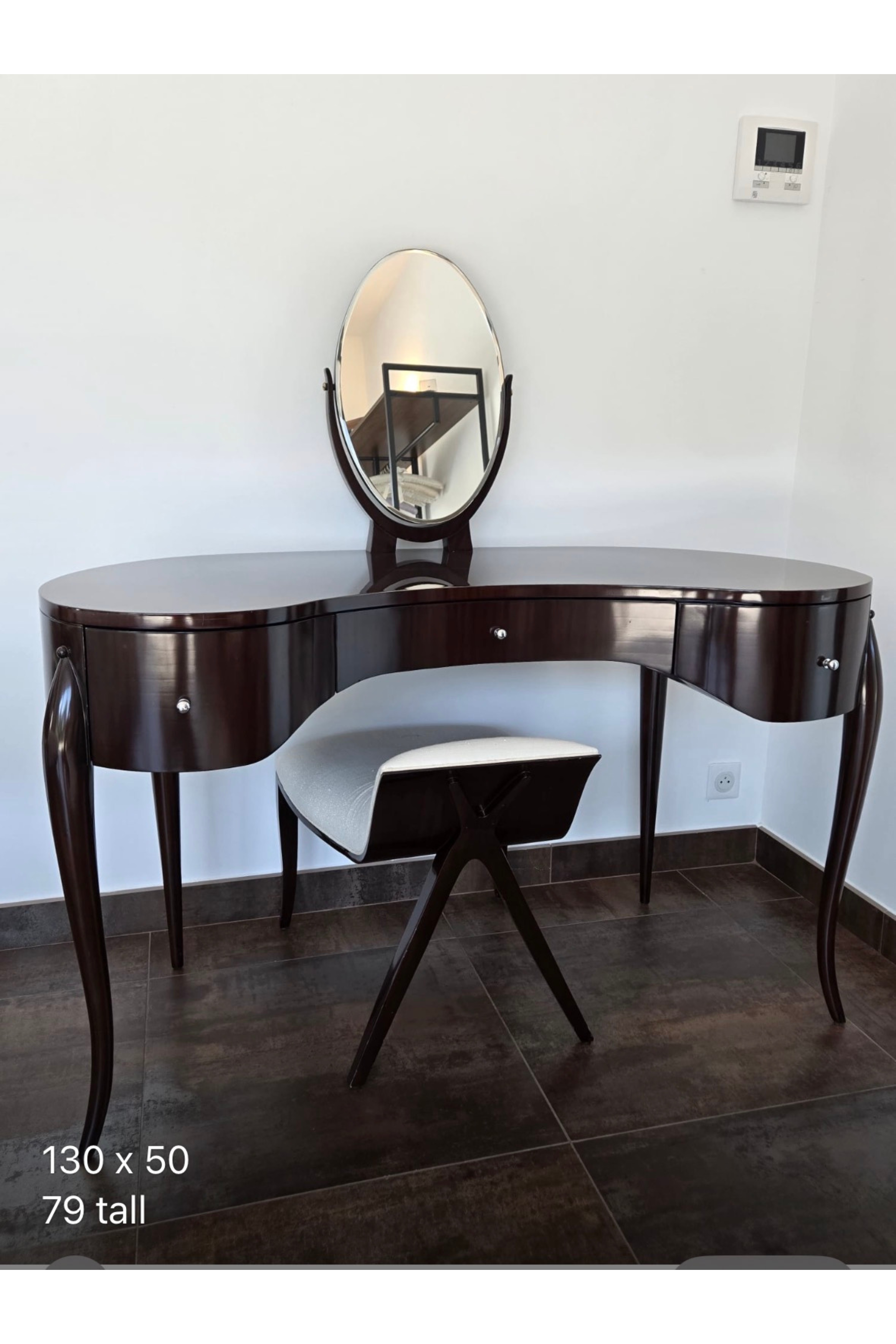 Marina Fogg Allegra dressing table with mirror and stool featuring a sculptural curved design and smooth wood finish.