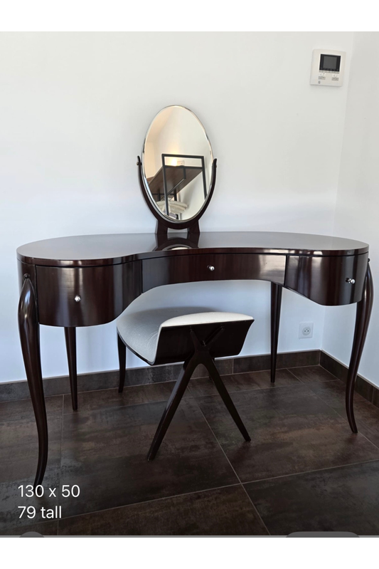 Marina Fogg Allegra dressing table with mirror and stool featuring a sculptural curved design and smooth wood finish.