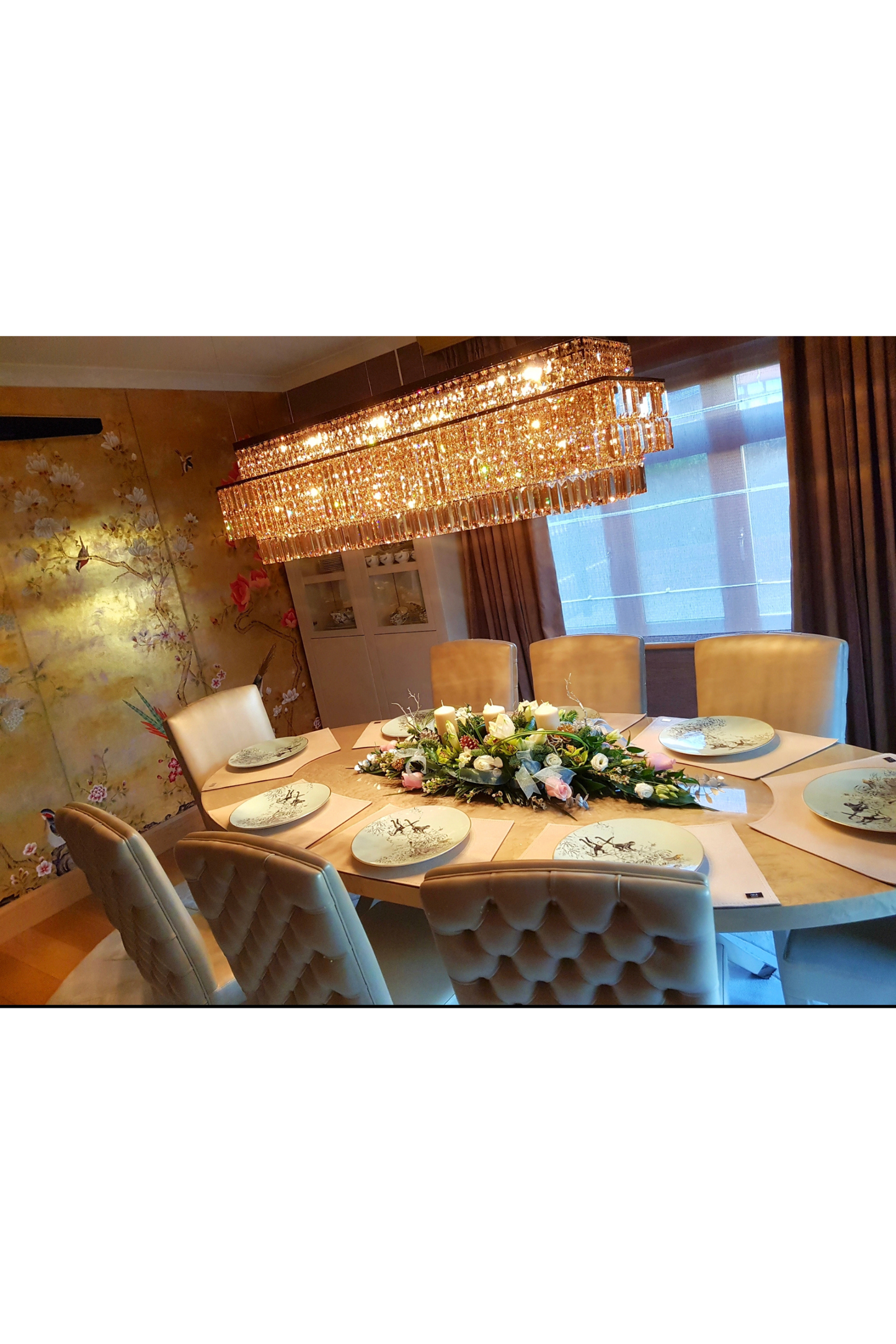Fendi Casa dining table with eight matching chairs, elegant wooden set by Marina Fogg, showcasing a modern dining room setup.