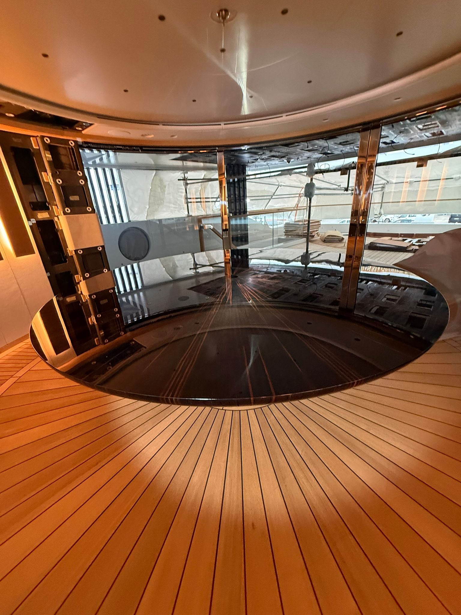 Custom yacht dining table by Ilyana Popova, Ø250 cm, showcasing a bespoke design with polished wood surface and elegant craftsmanship.