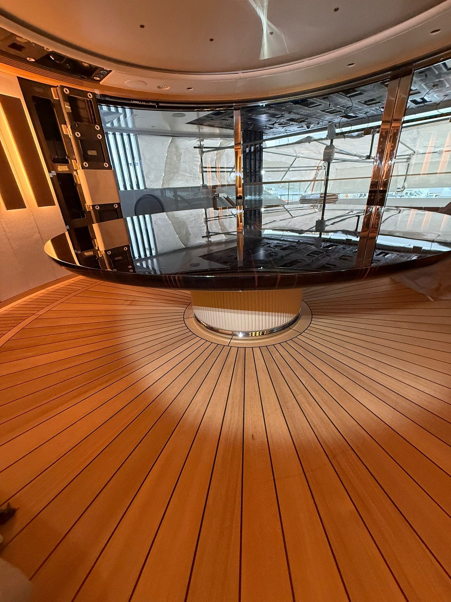 Custom yacht dining table by Ilyana Popova, 250cm diameter, showcasing a bespoke, elegant wood design suitable for luxury yacht interiors.