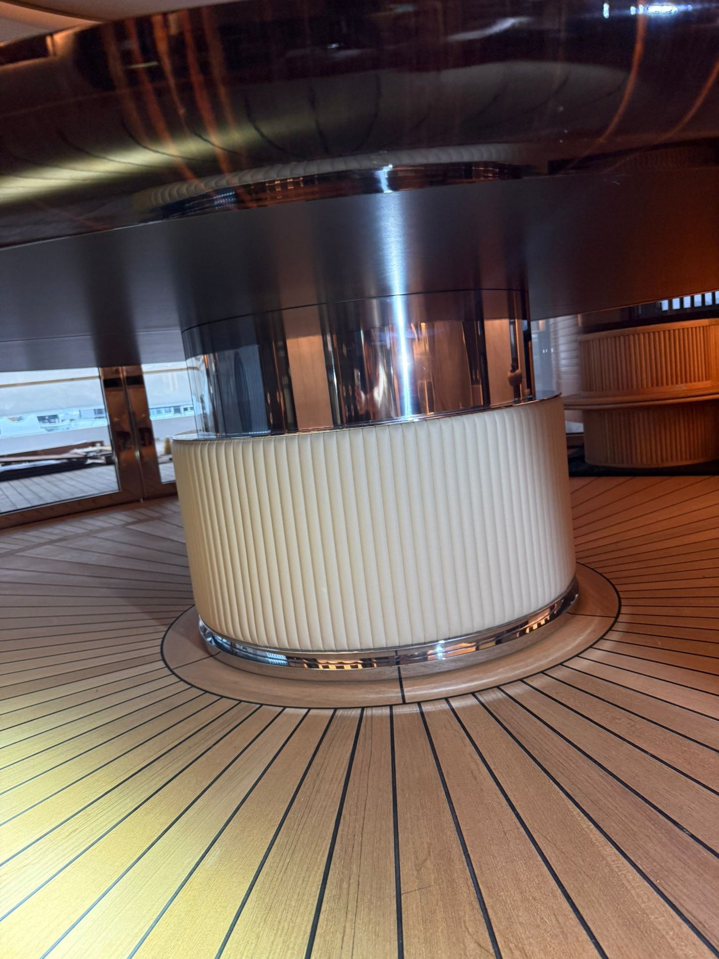 Custom Ilyana Popova yacht dining table with a 250cm diameter, showcasing a bespoke design for luxury maritime interiors.