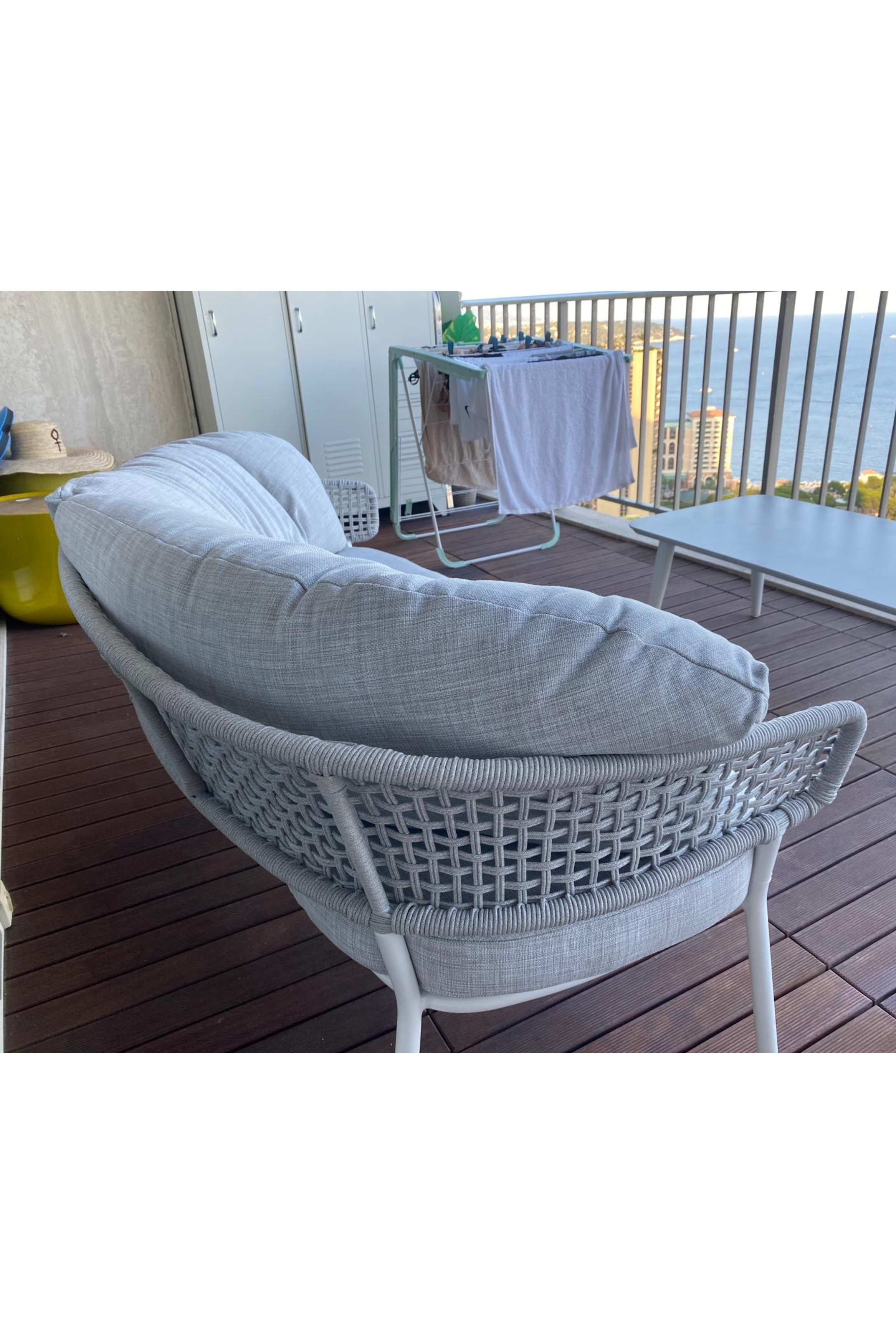 Talenti Moon Alu outdoor lounge set by Melanie Gouchon featuring a sofa, armchair, and coffee table in a stylish patio setting.