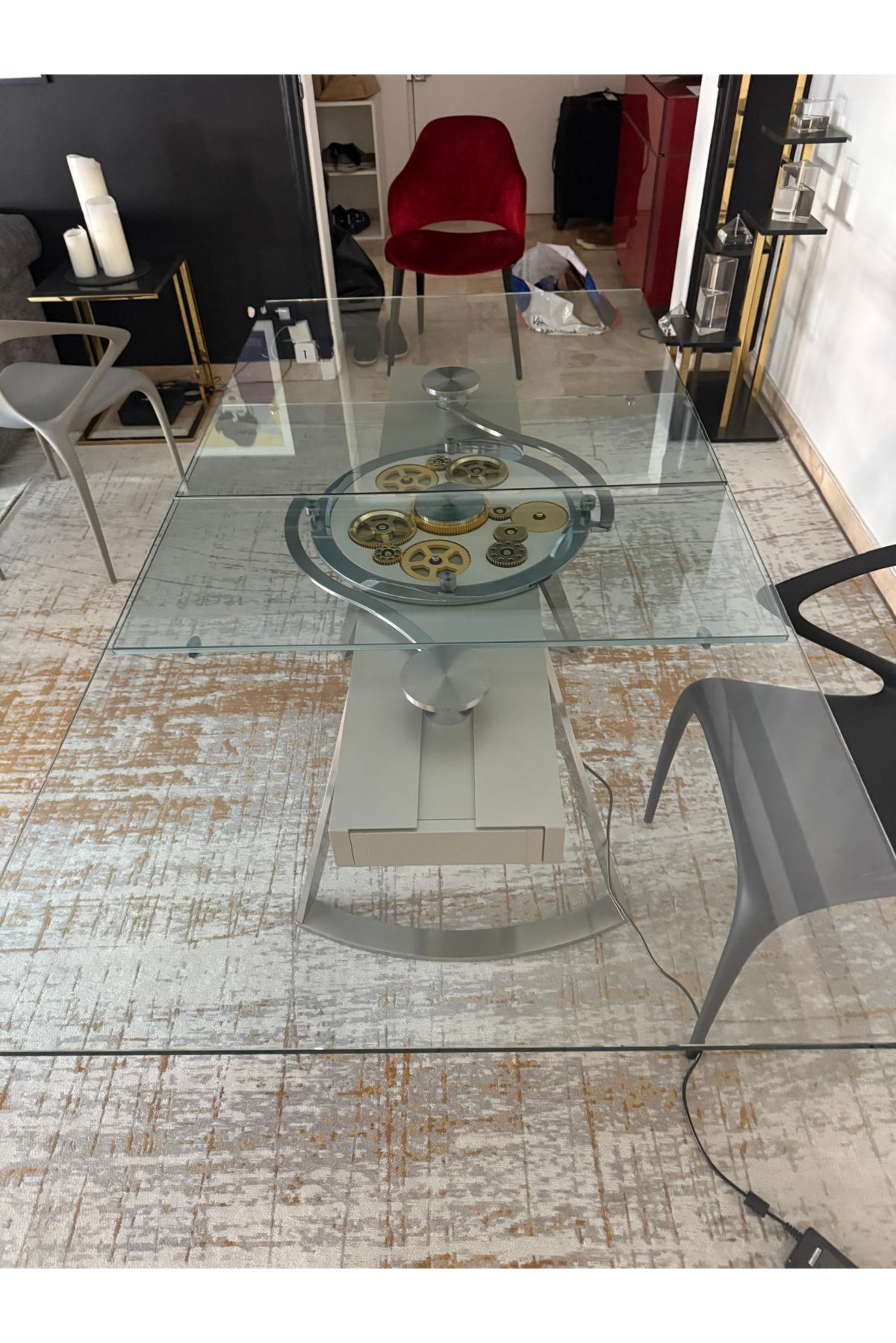 Roche Bobois Astrolab dining table in a modern dining room with sleek design and wooden finish, by Serpil Barrington-Serle.