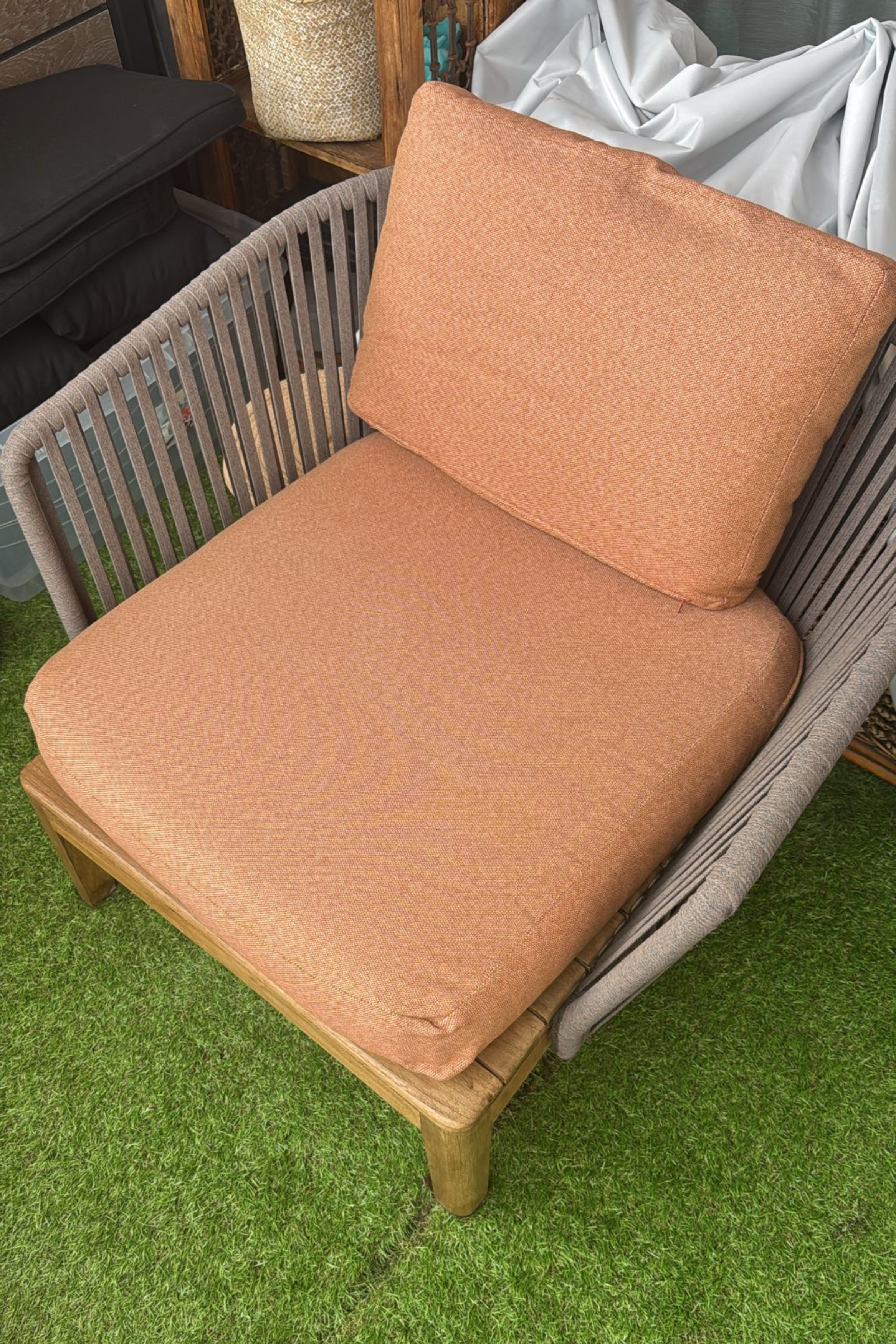 Outdoor lounge set with two sofas and armchair by Anastasia Tarutova, featuring matching covers for stylish outdoor seating.