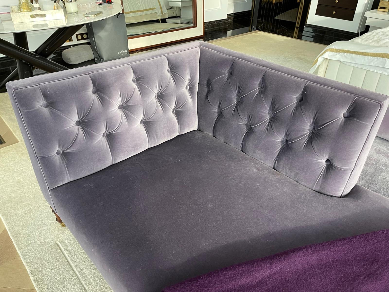 Purple velvet lounge sofa by Yvette Stokes, Casa Armani Reserve collection, showcasing plush upholstery and stylish design.
