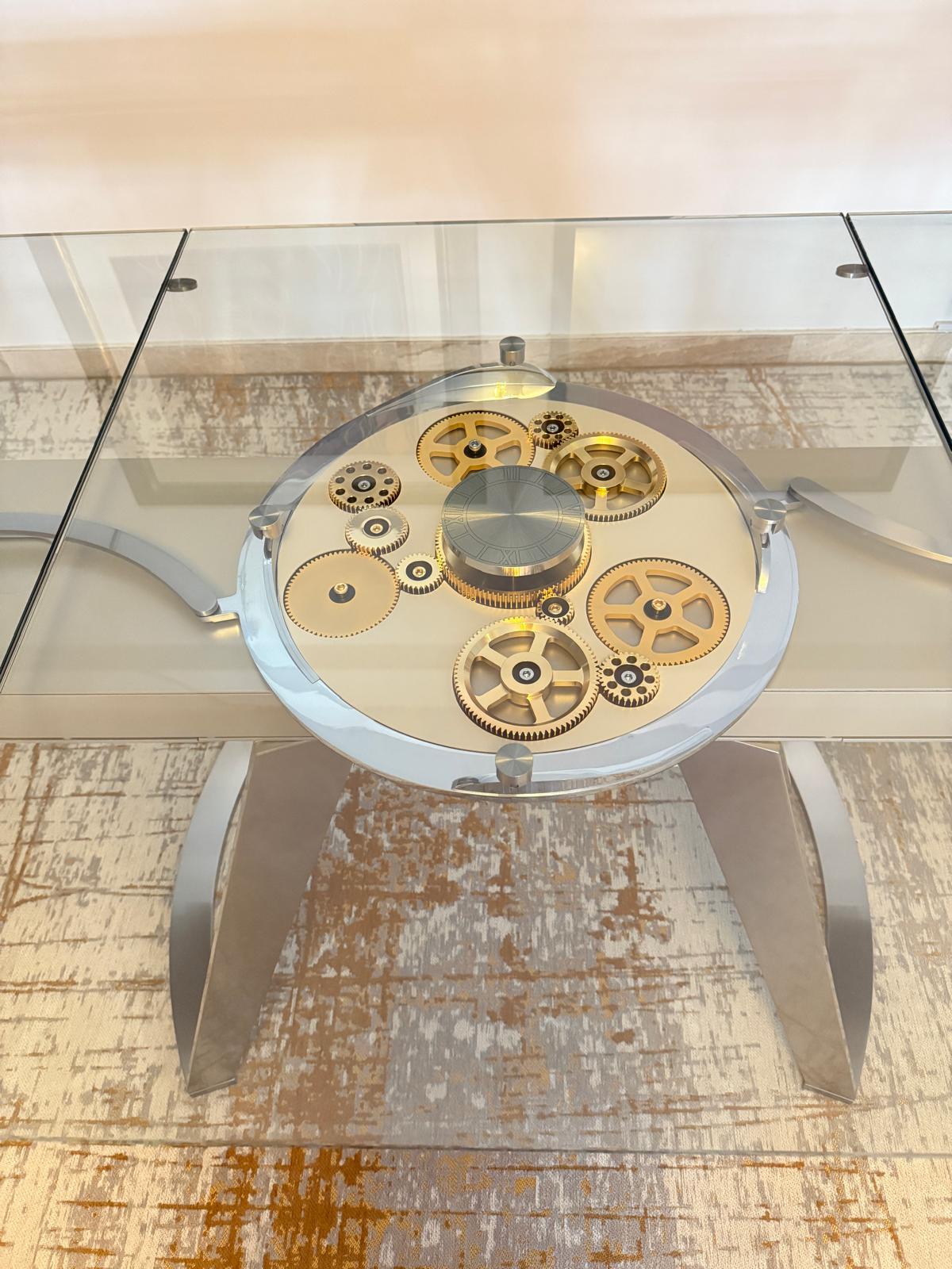 Contemporary Roche Bobois Astrolab dining table by Serpil Barrington-Serle with a sleek, modern tabletop and stylish metal legs.