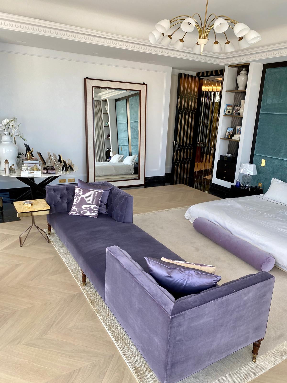 Purple velvet lounge sofa from Casa Armani by Yvette Stokes, showcasing plush fabric and modern design.