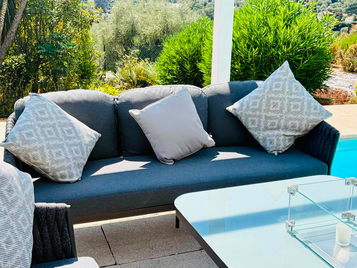 Harbour Lifestyle Luna three-seat sofa with grey and patterned scatter cushions, close view